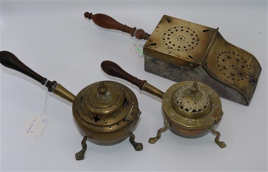 Pierced brass piano-front ember box, turned wood handle and two similar circular examples (3)